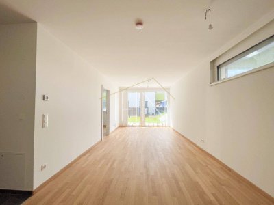 Stilvoller Erstbezug mit Garten, Garagenplatz und Gemeinschaftsdachterrasse