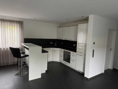 Moderne 2-Zimmer-Wohnung mit Balkon, Küche & TG-Stellplatz