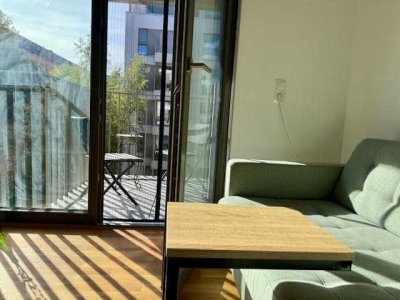 Helle, unmöblierte 1,5-Zimmer-Neubauwohnung mit Südwestbalkon und hochwertiger SieMatic Einbauküche