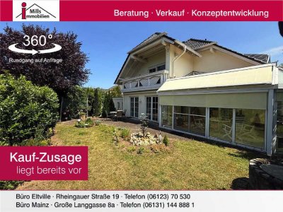 Großzügiges, freistehendes Architektenhaus mit super schönem Garten und tollem Blick in Weinbe