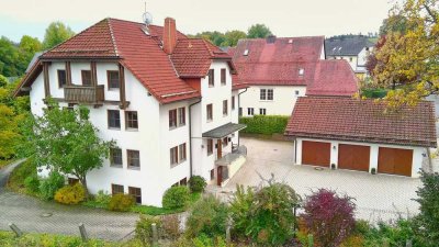 Raum für Visionen! Wohn-und Geschäftshaus mit großem Gartengrundstück