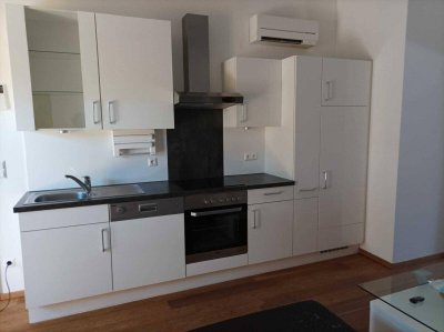 Gemütliche, klimatisierte 2-Zimmer-Mietwohnung mit Terrasse und möblierter Küche in ruhiger Lage Ried