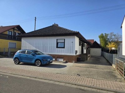 Einfamilienhaus mit Einliegerwohnung, Garten, Pool und 236 m² Wohnfläche in Lustadt