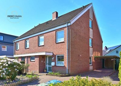 Doppelhaushälfte in Holm mit schönem Garten und viel Platz - 
Ideal für Familien!