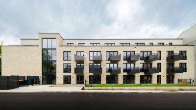 Neubau: 1-Zimmer-Wohnung mit Einbauküche und Terrasse