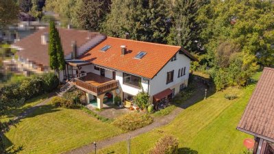 Familienfreundliches Haus mit zwei Wohneinheiten und großem Garten in ruhiger Lage von Neutrauchburg