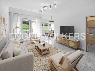 Wohnen im Grünen: Lichtdurchflutete Drei-Zimmer-Maisonette mit Dachterrasse