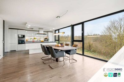 Sonnenanbeter aufgepasst: Modernes Einfamilienhaus mit Einliegerwohnung und Garten! Einmaliger Blick