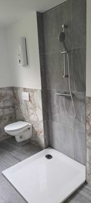 Neu 2025! Moderne DG-Wohnung in Lünen mit Balkon & Stellplatz