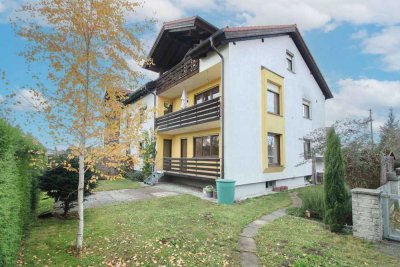 Gepflegte 3-Zi. Hochparterre Wohnung mit eigenem Garten, Einzelgarage und Außenstellplatz