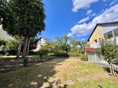 Familienfreundliches Einfamilienhaus mit ELW in Südwestlage, großem Garten und Ausbaupotenzial