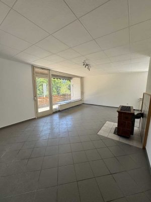 Attraktives, vermietetes Einfamilienhaus mit Einliegerwohnung in begehrter grüner Lage