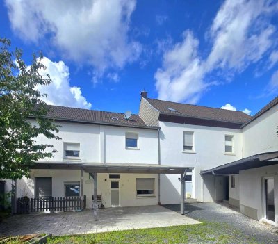 Mehrfamilienhaus + Einfamilienhaus