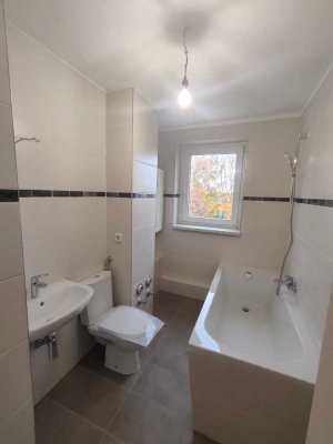 Erstbezug nach Sanierung: Hochwertig und frisch sanierte 4-Raum-Wohnung mit EBK ab sofort verfügbar