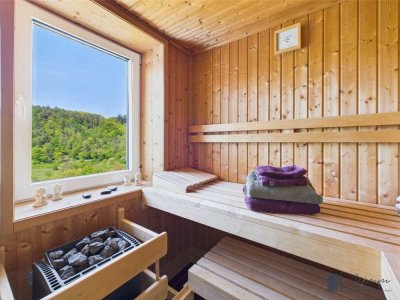 Modernes Wohnen auf hohem Niveau: Exklusive Eigentumswohnung mit Balkon, Sauna und Garage!
