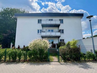Vermietete Erdgeschosswohnung mit Garten, Terrasse und Garagenstellplatz