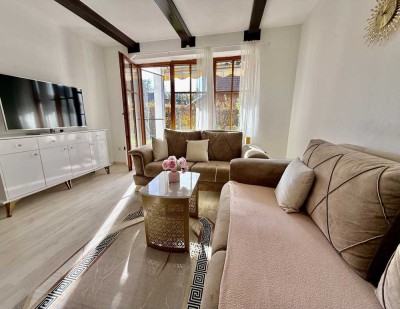 Wohlfühlen leicht gemacht - attraktive 2-Zimmer-Wohnung mit Südterrasse und Gartenanteil