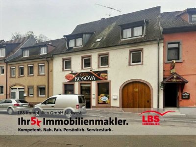 Exklusives Haus mit sehr gut vermietetem Gewerbe!