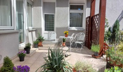 Gepflegte 2-Zimmer EG-Wohnung mit Terrasse