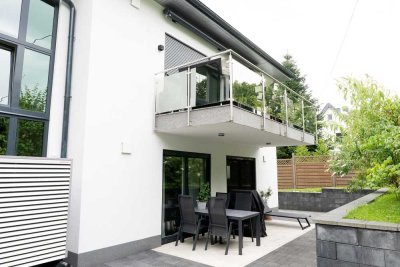 Moderne Erdgeschosswohnung mit Garage