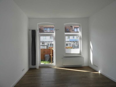 Schöne Sanierte 2 Zimmer Wohnung mit einem Garten!