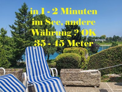 45 m2 Terrasse mit Seeblick der beeindruckt ! 117 m2 Nutzfläche = 63 m2 Wohnfläche + 54 m2 Terrassen ! + je nach Größe der Autos bis zu 3 Parkplätze inkl. + über 20 Jahre nur im Sommer von Fr -So genutzt + gepflegt + Gärtner + vor Hochwasser gesicherte In