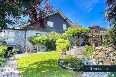 Großzügiges Wohnhaus mit 2 Einheiten, Doppelgarage & Garten - absolute Ruhiglage in Bedburg-Kaster