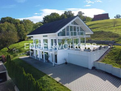 Einfamilienhaus mit architektonischer Transparenz – Weitblick inklusive