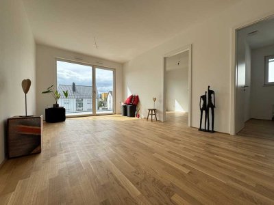 Von Privat Mühlheim-Markwald: Neubau, 2 Zi-Whg, tolle EBK, großer Balkon, Tiefgarage & Aufzug