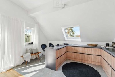 Erstbezug: 3 Zimmer Dachgeschosswohnung mit attraktivem Balkon nach Westen