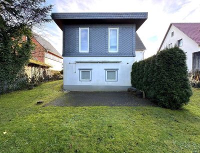 Nicht vermietetes Einfamilienhaus mit Einliegerwohnung und Garagen in Top Wohnlage