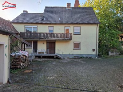Vielseitiges Einfamilienhaus mit großem Garten und Nebengebäude in 97340 Martinsheim