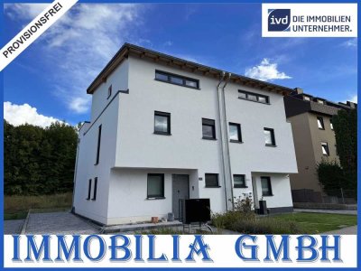 Neubau-Doppelhaushälfte in Zweibrücken: Wohnen am Jacobyberg im modernen Stil mit Garten