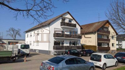 Vollvermietetes  Renditeobjekt: Mehrfamilienhaus mit 7 Wohnungen und 2 Gewerbehallen