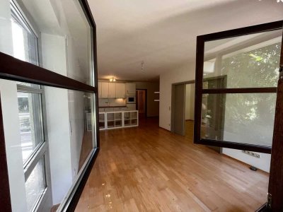 Wohnen mit Garten: 1,5-Zimmer-Wohnung mit Gartenanteil und Tiefgarage bei Planegg