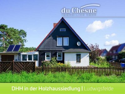 Charmante Doppelhaushälfte in der historischen Holzhaussiedlung