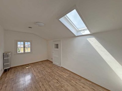 Dachgeschosswohnung in denkmalgeschütztem Anwesen