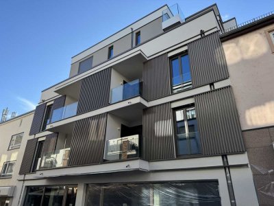Neubau/Erstbezug: Traumhafte 4-Zimmerwohnung mit 2 großen Terrassen mit Feldberg- und Skylineblick
