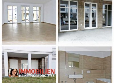 Moderne 2-Zimmer-Erdgeschosswohnung mit Terrasse und Rasen