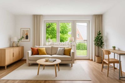 Charmante 3-Zimmer-Obergeschosswohnung mit Balkon, Gartenblick und Garage