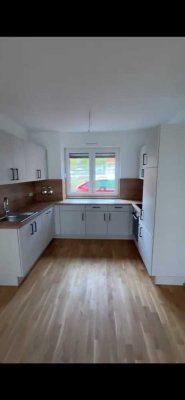 Neubauwohnung mit Garten und Terrasse