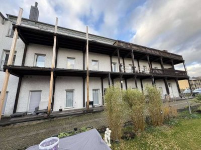 Investmentchance: Mehrfamilienhaus mit 14 Einheiten & Wohngrundstück für Neubau bei Leverkusen