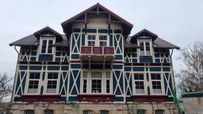 Traumhafte Erdgeschosswohnung in historischer Villa mit Panoramablick