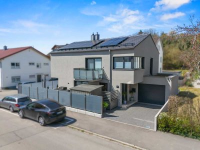 Clean Chic - Energieeffizientes Einfamilienhaus mit Einliegerwohnung in KN-Wollmatingen