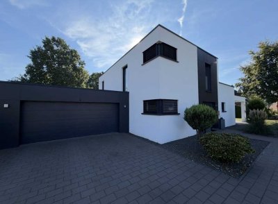 Modernes Architektenhaus mit pflegeleichtem Garten, exklusiver Dachterrasse und Top-Ausstattung
