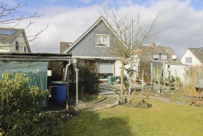 Großzügiges Familienhaus mit Einliegerwohnung, Gartenidylle citynah und ruhig