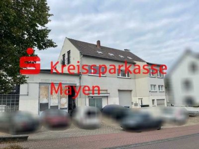 Mehrfamilienhaus mit Gewerbehalle