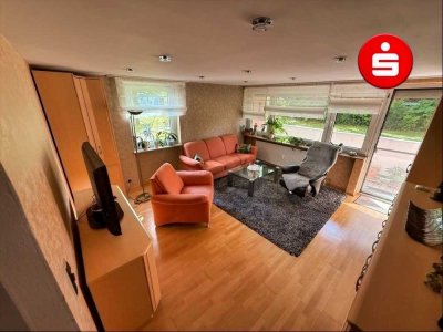 Erdgeschosswohnung mit Westloggia und Garage in zentraler Lage