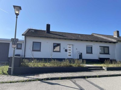 Einfamilienhaus im Bungalowstil mit großem Garten