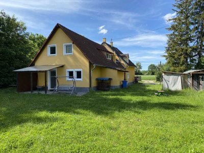 Großes Grundstück mit energetisch modernisiertem 2 Familienhaus direkt vor den Toren Münchens!